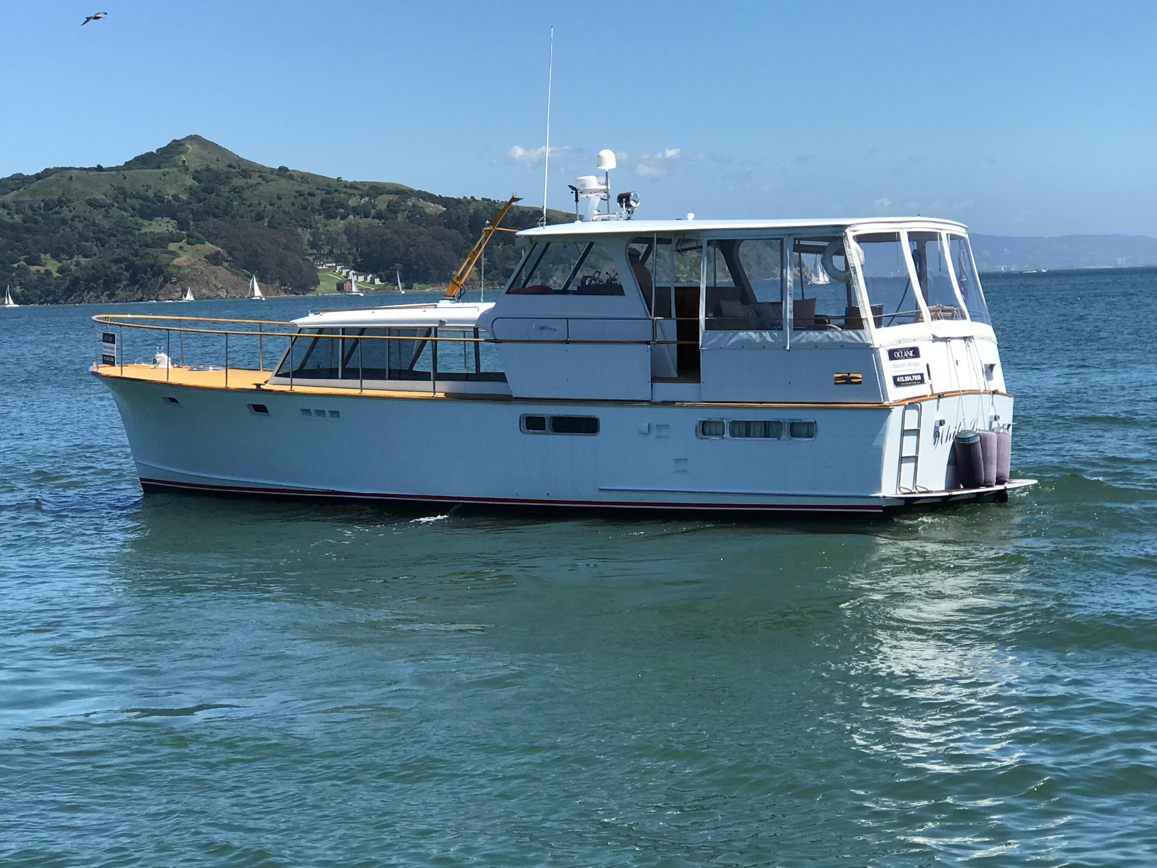 flush deck motor yachts for sale